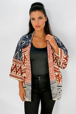 Ruana Manga Corta Bolsillos Rombos Terracota