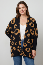 Ruana Animal Print Mangas Mostaza