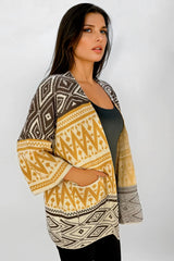 Ruana Manga Corta Bolsillos Rombos Mostaza