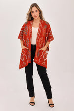 Ruana Figuras Bolsillos Terracota