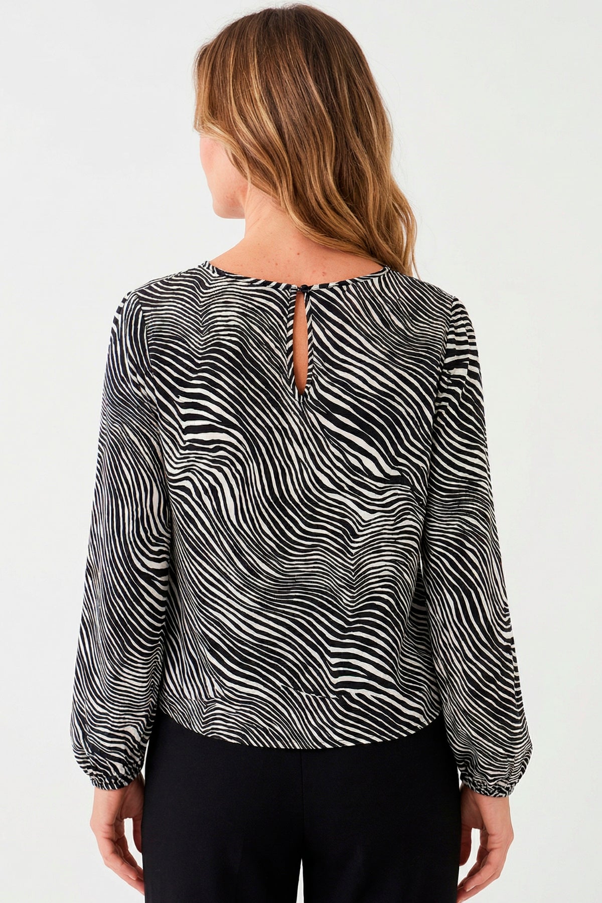 Blusa manga larga estampado cebra en rayón para mujer negro